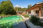 Exklusiver Bungalow in Sonnenlage mit Schwimmteich